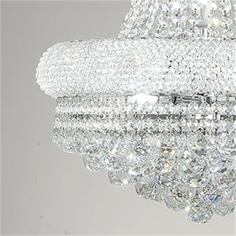 Close-up of a crystal chandelier with a gray background