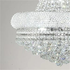Close-up of a crystal chandelier with a gray background
