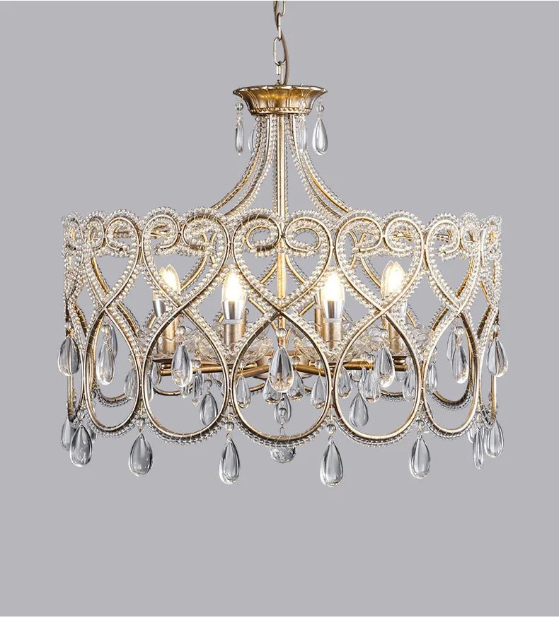 Decorative chandelier with crystal elements on a gray background