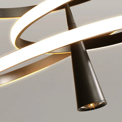 Modern ceiling light fixture with black and gold design on a neutral background