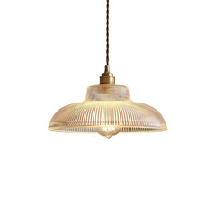 Pendant light with ribbed glass shade on a white background