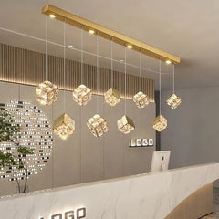Modern chandelier with gold accents in a stylish interior setting.