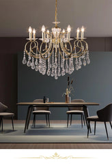 Gold Crystal Chandelier with Swirling Arms and Candle-Style Lights