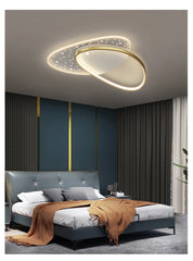 Modern bedroom with a ceiling light fixture