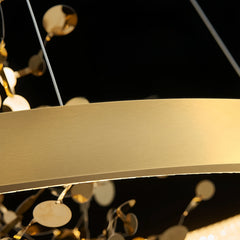Close-up of a metallic strip with blurred decorative lights in the background