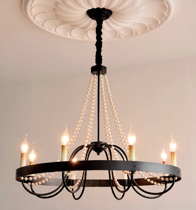 Chandelier with multiple lights on a neutral background