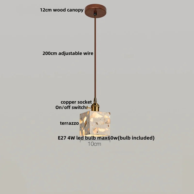 Pendant light with terrazzo shade on a gray background, labeled with features.