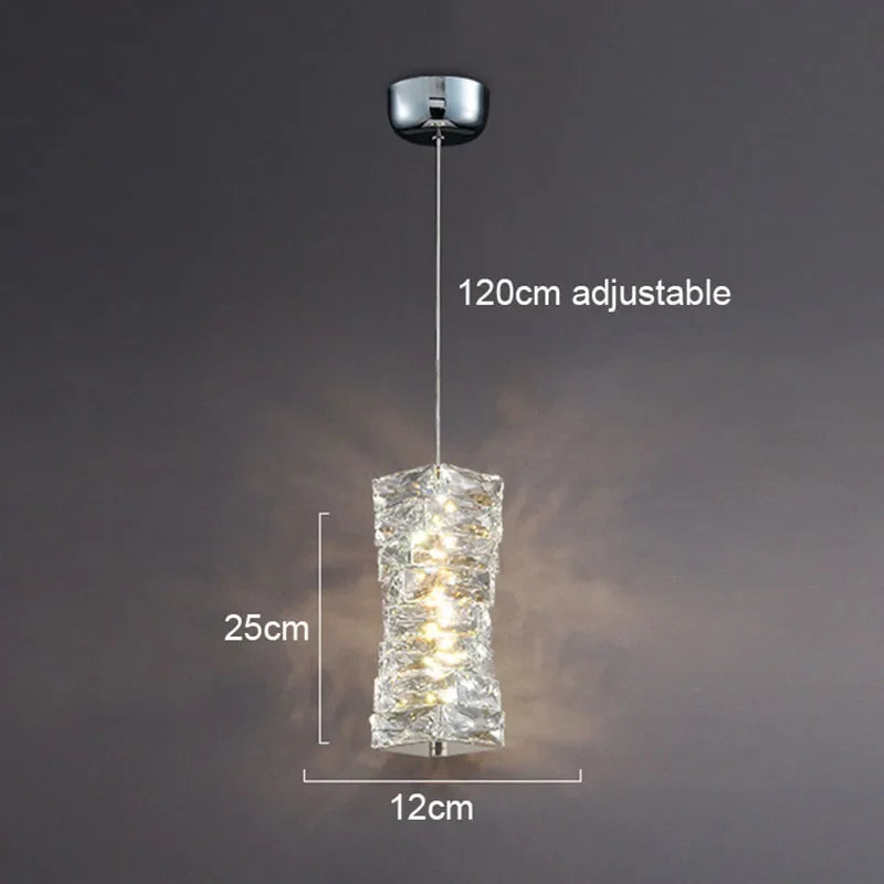 Crystal pendant light with adjustable feature on a dark background