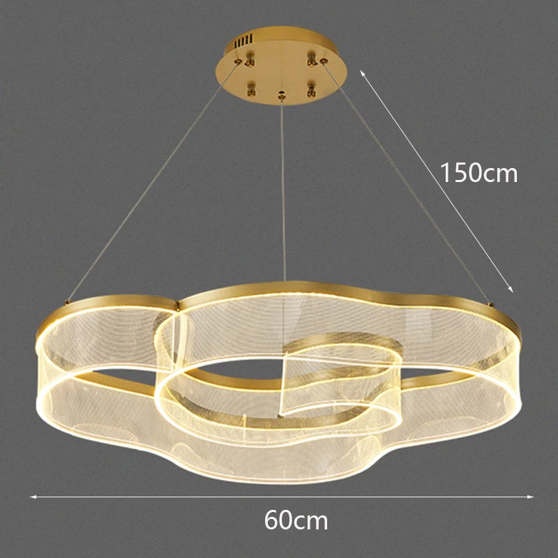 Gold pendant light with dimensions on a dark background