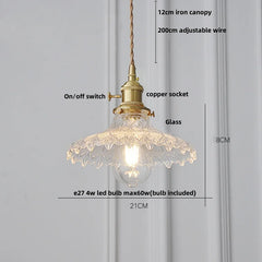 Pendant light with clear glass shade and gold fixture, labeled with features and dimensions on a gray background.