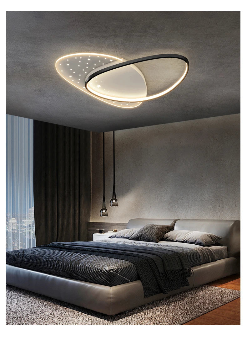 Modern bedroom with a stylish ceiling light fixture.