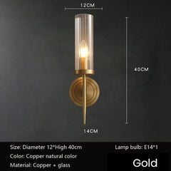 Gold wall sconce with dimensions and bulb information on a dark background