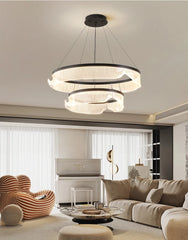 Modern chandelier in a living room with a piano and stylish decor