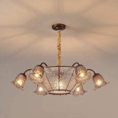 View of the bronze floral glass shade chandelier from below.