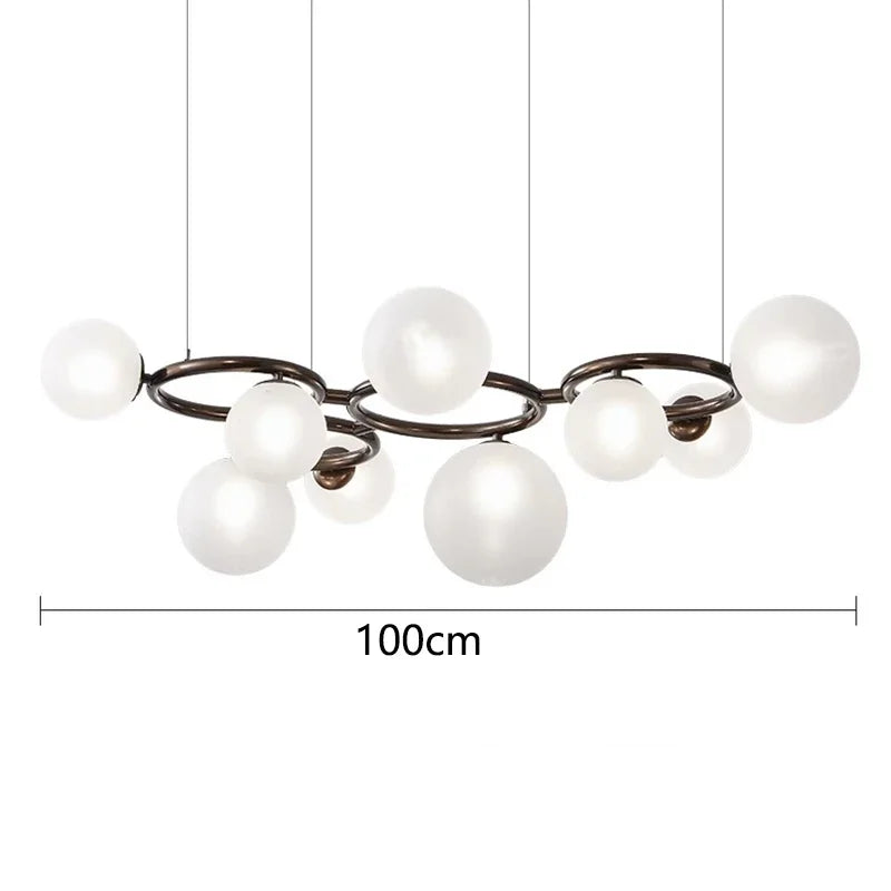 Chandelier with white spherical lights and a black metal frame, shown with dimensions on a white background.