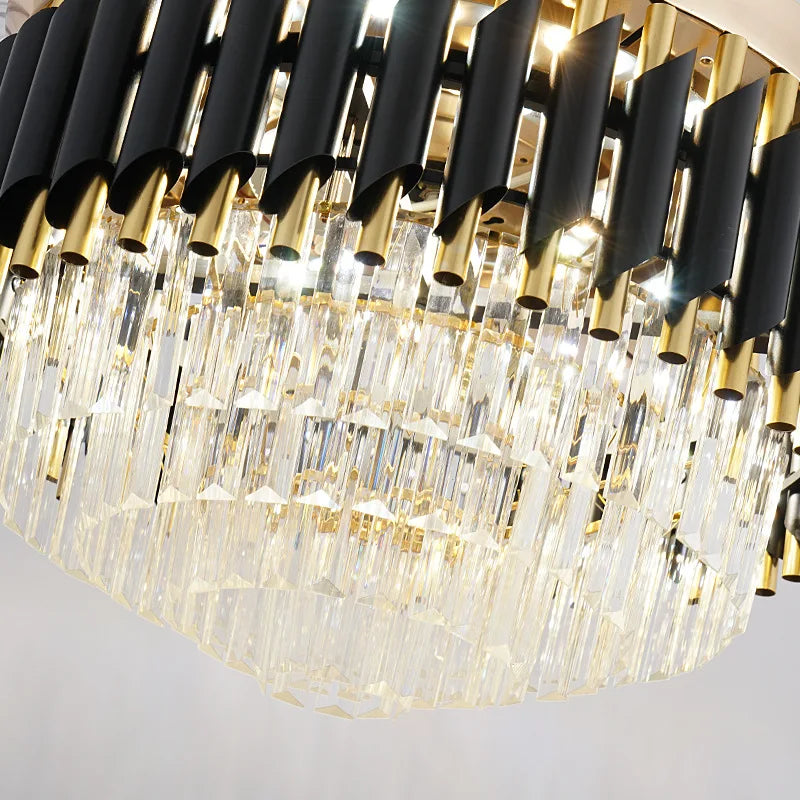 Luxury chandelier with black and gold accents on a white background
