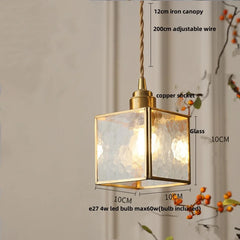 Pendant light with dimensions labeled on a neutral background
