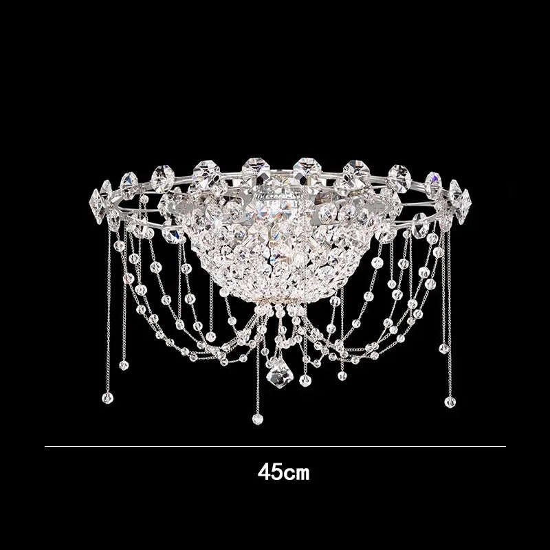Decorative ceiling light fixture with crystal details on a black background