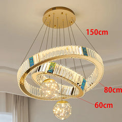 Gold chandelier with dimensions indicated on a neutral background