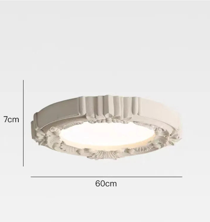 Round ceiling light fixture with dimensions on a white background