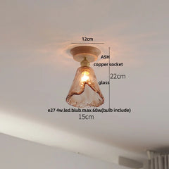 Ceiling light fixture with measurements labeled on a white ceiling.