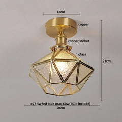 Gold ceiling light fixture with geometric design, labeled parts, and dimensions on a gray background.