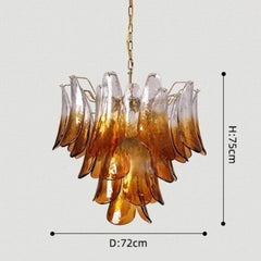 Chandelier with amber and clear glass shades on a light gray background