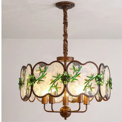 Bronze Chandelier with Frosted Glass and Green Leaf Floral Accents