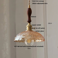 Pendant light fixture with detailed measurements and features on a neutral background