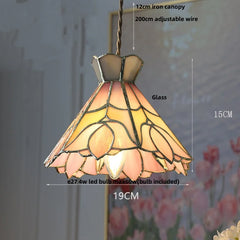 Stained glass pendant light with dimensions and bulb information on a floral background