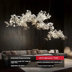 Modern chandelier hanging above a living room with detailed specifications.