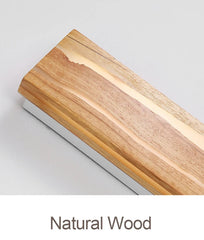 Wooden cutting board with a natural finish on a light gray background