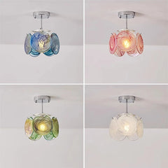 Chain-hung type floral glass pendant light in pink and white swirls, suspended by a chain.