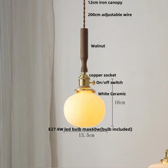 Pendant light with labeled components on a white background
