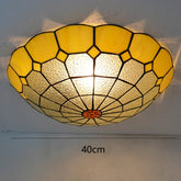 Close-up of a yellow stained glass ceiling light with a scalloped edge and a 40cm diameter indicated.