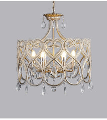 Decorative chandelier with crystal elements on a gray background
