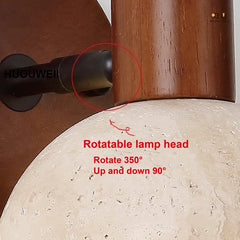 Close-up of a lamp with a rotatable lamp head feature highlighted.