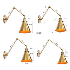 Brushed gold adjustable wall sconce with a wider, flatter shade, seen from the side.