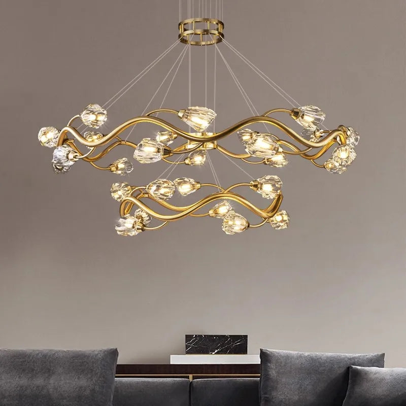 Close-up view of the gold wavy crystal chandelier, highlighting the intricate design and crystal details.