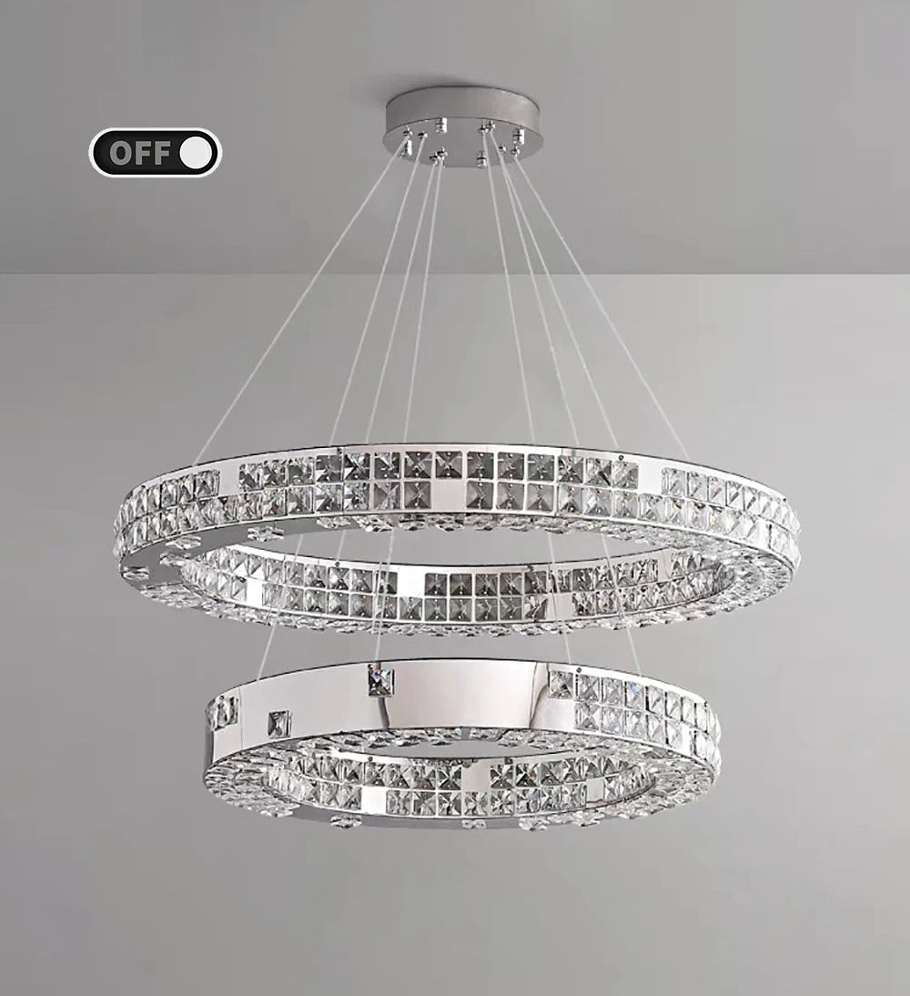 Chandelier with three circular tiers on a gray background