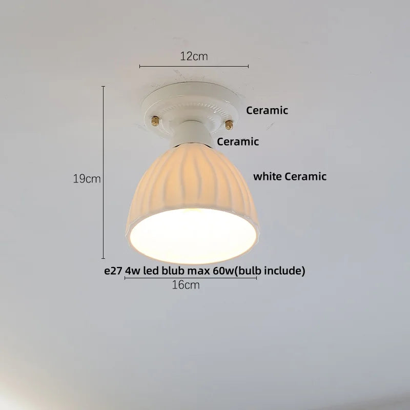 White ceramic ceiling light fixture with dimensions and bulb information on a gray background