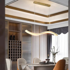 Modern dining room with a stylish chandelier, table, chairs, and wine rack.