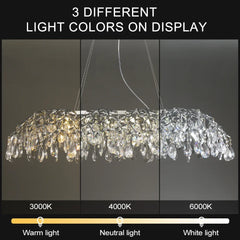 A smaller chrome chandelier with cascading crystals in a different room setting.
