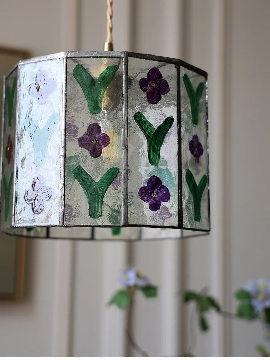 Decorative lampshade with floral patterns on a neutral background