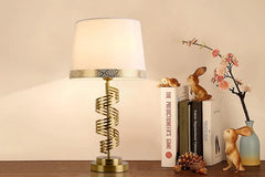Gold Spiral Table Lamp with Geometric Band Fabric Shade