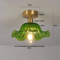 Green glass ceiling light fixture with measurements on a gray background