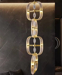 Decorative chandelier with gold and clear design on a dark background