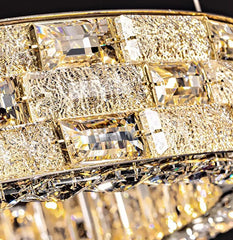 Close-up of a gold and crystal chandelier