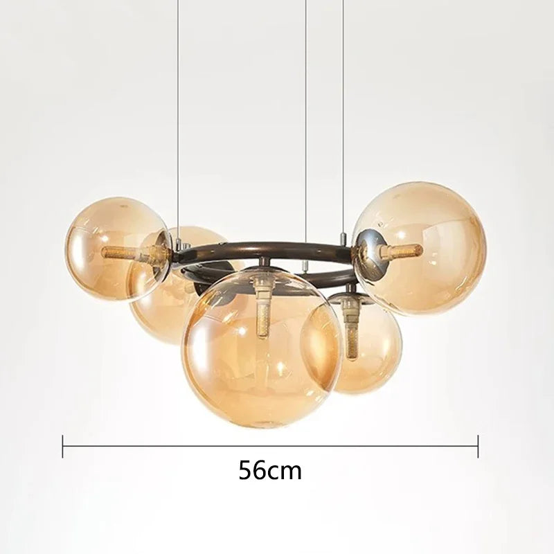 Chandelier with gold glass bulbs and measurement label on a white background
