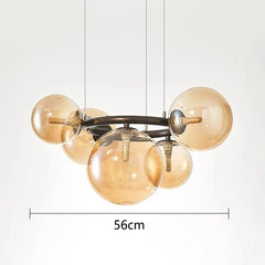 Chandelier with gold glass bulbs and measurement label on a white background